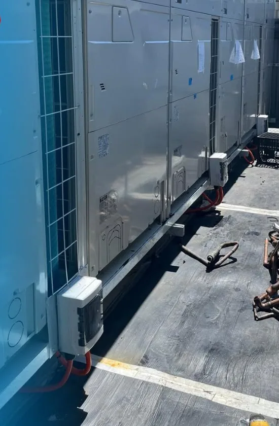 Row of Daikin VRV outdoor units on a commercial rooftop